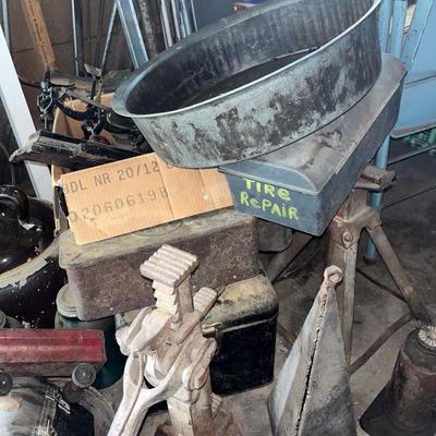 Sale Photo Thumbnail #705: Globe, window, pails and containers, jugs, saws, jacks, etc.