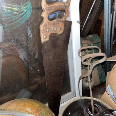 Sale Photo Thumbnail #704: Globe, window, pails and containers, jugs, saws, jacks, etc.