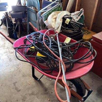 Sale Photo Thumbnail #813: Wheelbarrow, hose, pressure washer attachment