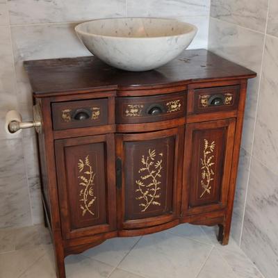 Wood Cabinet Vanity with Marble Vessel Sink and Gold Floral Detail