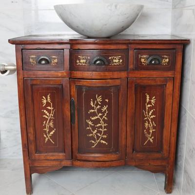 Wood Cabinet Vanity with Marble Vessel Sink and Gold Floral Detail