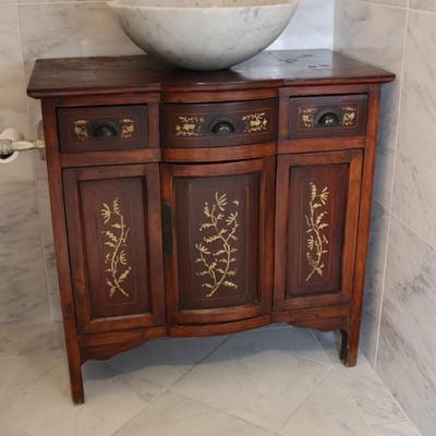 Wood Cabinet Vanity with Marble Vessel Sink and Gold Floral Detail