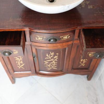 Wood Cabinet Vanity with Marble Vessel Sink and Gold Floral Detail