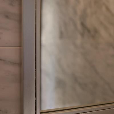 Silver-Framed Mirror with Arched Top