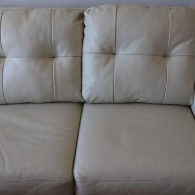 Ashley Furniture Cream Faux Leather Sleeper Sofa