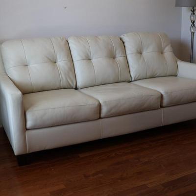 Ashley Furniture Cream Faux Leather Sleeper Sofa