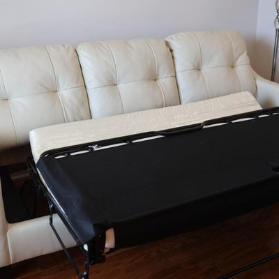 Ashley Furniture Cream Faux Leather Sleeper Sofa