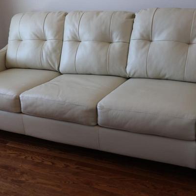 Ashley Furniture Cream Faux Leather Sleeper Sofa