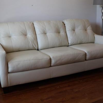 Ashley Furniture Cream Faux Leather Sleeper Sofa