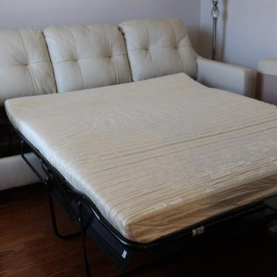 Ashley Furniture Cream Faux Leather Sleeper Sofa
