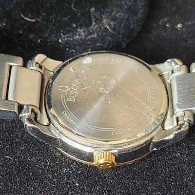 Sale Photo Thumbnail #576: Ladies Bulova Gold Silver tone 24 diamond accented watch.
Retails up to $285.00
New battery