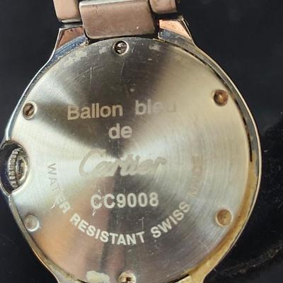 Sale Photo Thumbnail #586: SS case, quartz movement, water resistant, Swiss, 
Blue sapphire cabochon crown, fair condition.
Age related wear (could be buffed out by a jeweler)
Untested, may require winding, parts, service or repair.
We did not do any work on this watch due to the v