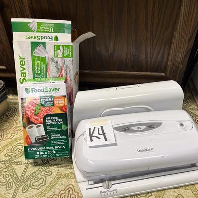 Sale Photo Thumbnail #1115: Vacuum food sealer, foodsaver rolls