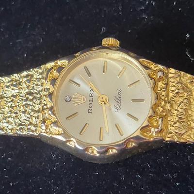 Sale Photo Thumbnail #594: We do not know if this is the brand name watch, it is being sold as is.
It will need a battery.
