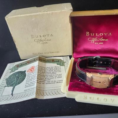 Sale Photo Thumbnail #599: Direct from the Estate to you !
In the original box, presentation case, and with warranty sheet.
1950s gold filled Bulova wristwatch    
SN 3910179
Not working, sold as is