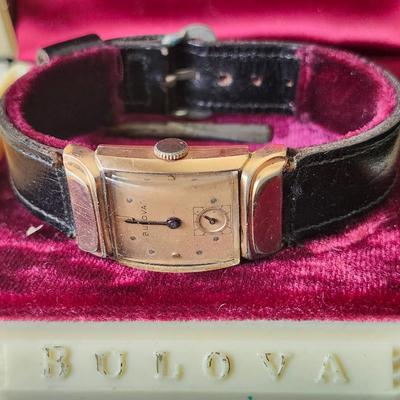 Sale Photo Thumbnail #600: Direct from the Estate to you !
In the original box, presentation case, and with warranty sheet.
1950s gold filled Bulova wristwatch    
SN 3910179
Not working, sold as is