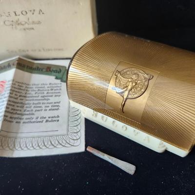 Sale Photo Thumbnail #602: Direct from the Estate to you !
In the original box, presentation case, and with warranty sheet.
1950s gold filled Bulova wristwatch    
SN 3910179
Not working, sold as is