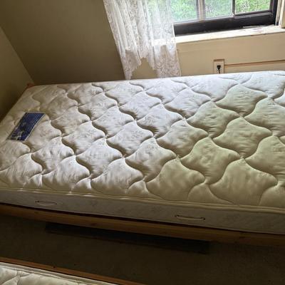 Twin size mattress and wooden frame