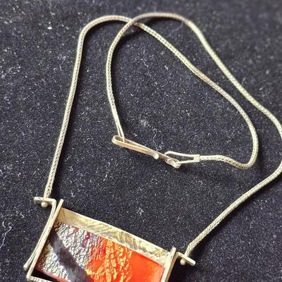 Sale Photo Thumbnail #621: Artisan Ann Grundler original art necklace, moslach glass set in sterling.  1.5 inches x 2 inches. 
9 inch drop.  
Retail $300+