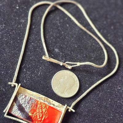 Sale Photo Thumbnail #622: Artisan Ann Grundler original art necklace, moslach glass set in sterling.  1.5 inches x 2 inches. 
9 inch drop.  
Retail $300+