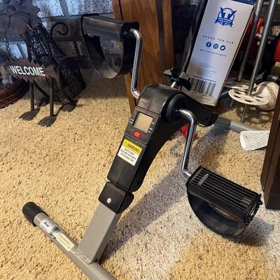 Sale Photo Thumbnail #1190: Ski poles, pedal machine, ring toss, etc.
