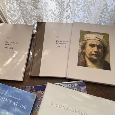 Variety of large hard covered books