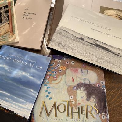 Variety of large hard covered books