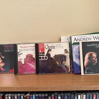 Very large collection of CDs, includes cd shelf