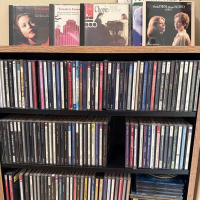 Very large collection of CDs, includes cd shelf
