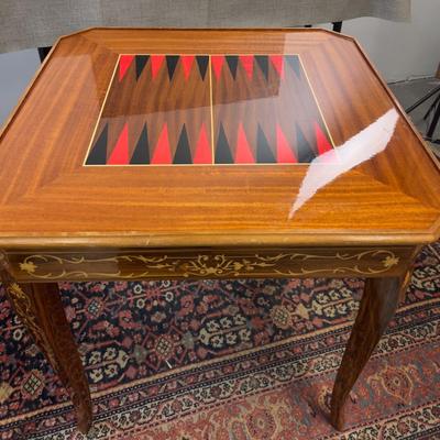 Sale Photo Thumbnail #17: Table is in excellent condition, 30" square and 30" tall. Beautifully kept circa 1960's inlay table. Chess, Checkers, Backgammon, Felt top for cards, including a roulette table. If shipping is desired we can facilitate dropping of at a crater/shipping com