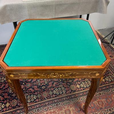 Sale Photo Thumbnail #20: Table is in excellent condition, 30" square and 30" tall. Beautifully kept circa 1960's inlay table. Chess, Checkers, Backgammon, Felt top for cards, including a roulette table. If shipping is desired we can facilitate dropping of at a crater/shipping com