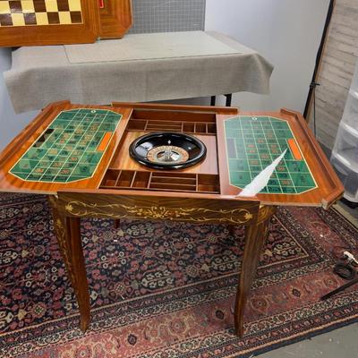 Sale Photo Thumbnail #21: Table is in excellent condition, 30" square and 30" tall. Beautifully kept circa 1960's inlay table. Chess, Checkers, Backgammon, Felt top for cards, including a roulette table. If shipping is desired we can facilitate dropping of at a crater/shipping com