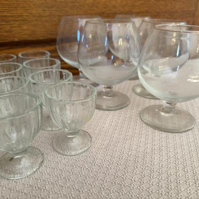 Brandy Snifter glasses 5, glass egg cups 8.