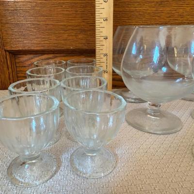 Brandy Snifter glasses 5, glass egg cups 8.