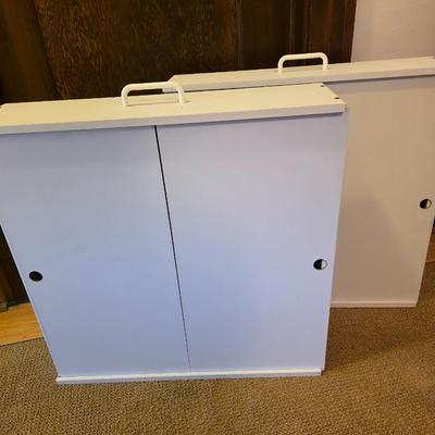 Two underbed roller storage drawers