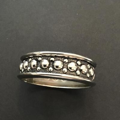 Silver, toned, hinged Cuff