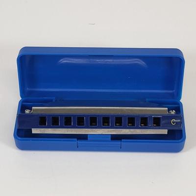 LOT 81: Vintage Instrument Lot of Ocarina and Size Variety of Four Harmonica's