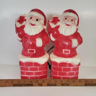 LOT 83: Pair of Vintage Santa Clause Blow Mold Decorations