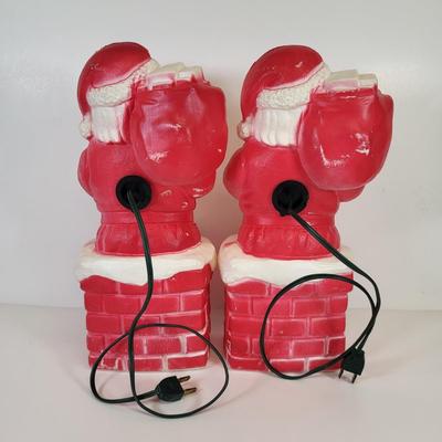 LOT 83: Pair of Vintage Santa Clause Blow Mold Decorations
