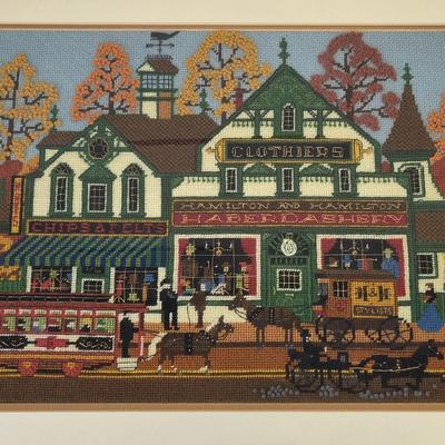 LOT 98: Framed Needlepoint Artwork by Charles Wysocki Adapted by Dimensions