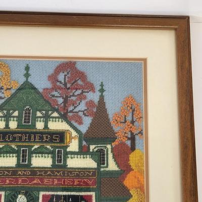 LOT 98: Framed Needlepoint Artwork by Charles Wysocki Adapted by Dimensions