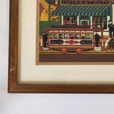 LOT 98: Framed Needlepoint Artwork by Charles Wysocki Adapted by Dimensions
