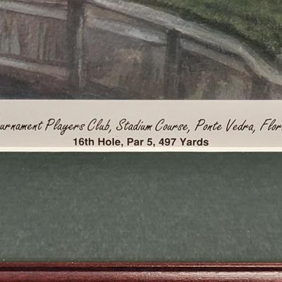 LOT 100: Framed Artwork of The 16th Hole of The Players Stadium Course at TPC Sawgrass in Ponte Vedra, Florida.