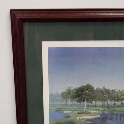 LOT 100: Framed Artwork of The 16th Hole of The Players Stadium Course at TPC Sawgrass in Ponte Vedra, Florida.