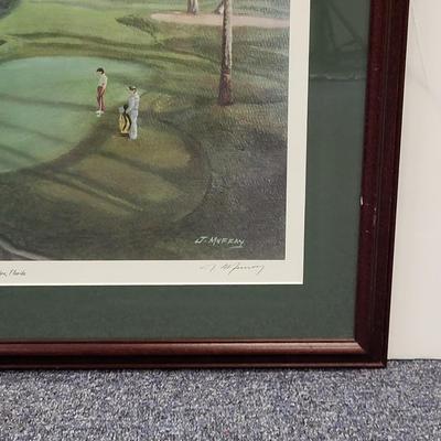 LOT 100: Framed Artwork of The 16th Hole of The Players Stadium Course at TPC Sawgrass in Ponte Vedra, Florida.
