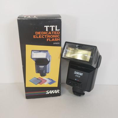 LOT 104: Vintage 110 Film Camera, Flash, Camcorder Light, Digital Camera Charger