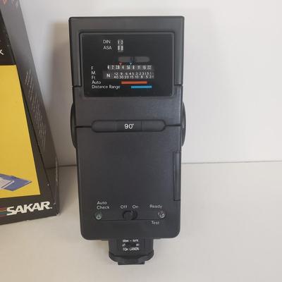 LOT 104: Vintage 110 Film Camera, Flash, Camcorder Light, Digital Camera Charger