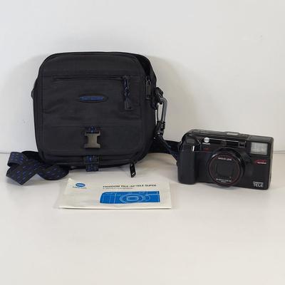 LOT 129: Pair of Olympus and Minolta Cameras With Travel Bags