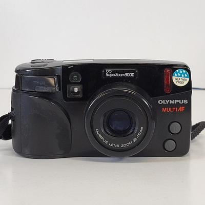 LOT 129: Pair of Olympus and Minolta Cameras With Travel Bags