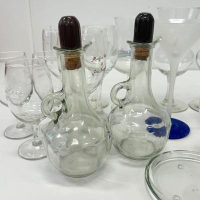 LOT 182: Large Lot of Glassware: Branded Stemware, Martini Glasses & More
